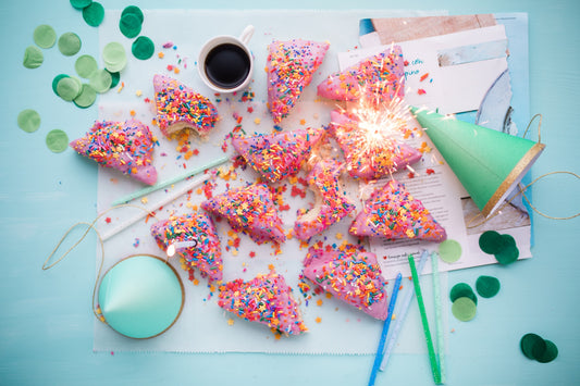 candy pizza with confetti and party hats