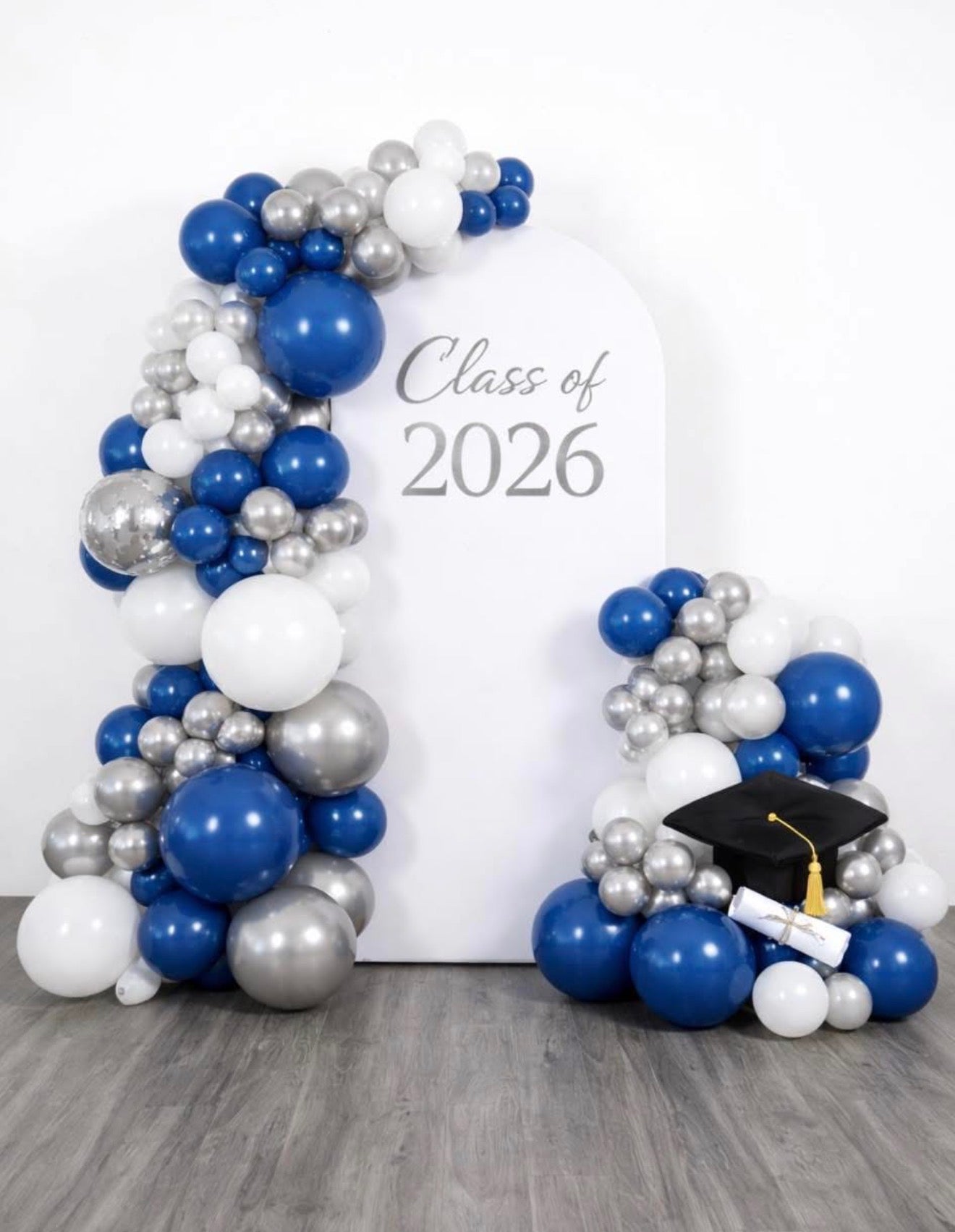 Graduation backdrop and balloons