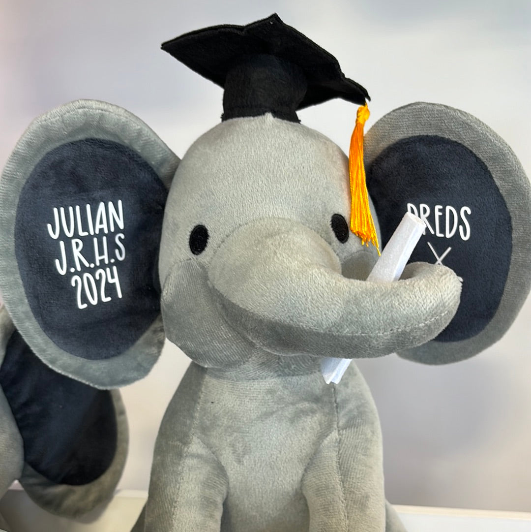 Éléphant en peluche diplômé